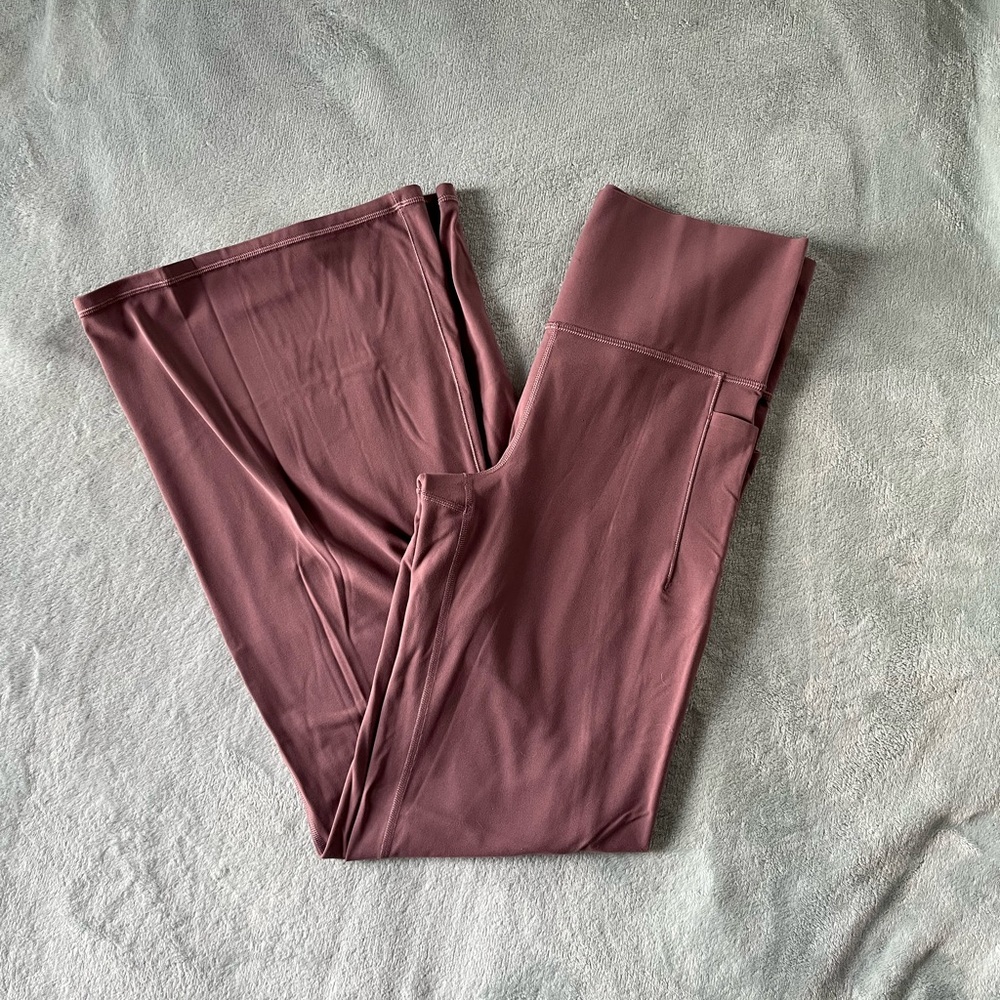 Athleta Salutation Flare leggings. Mauve Pink. Size large